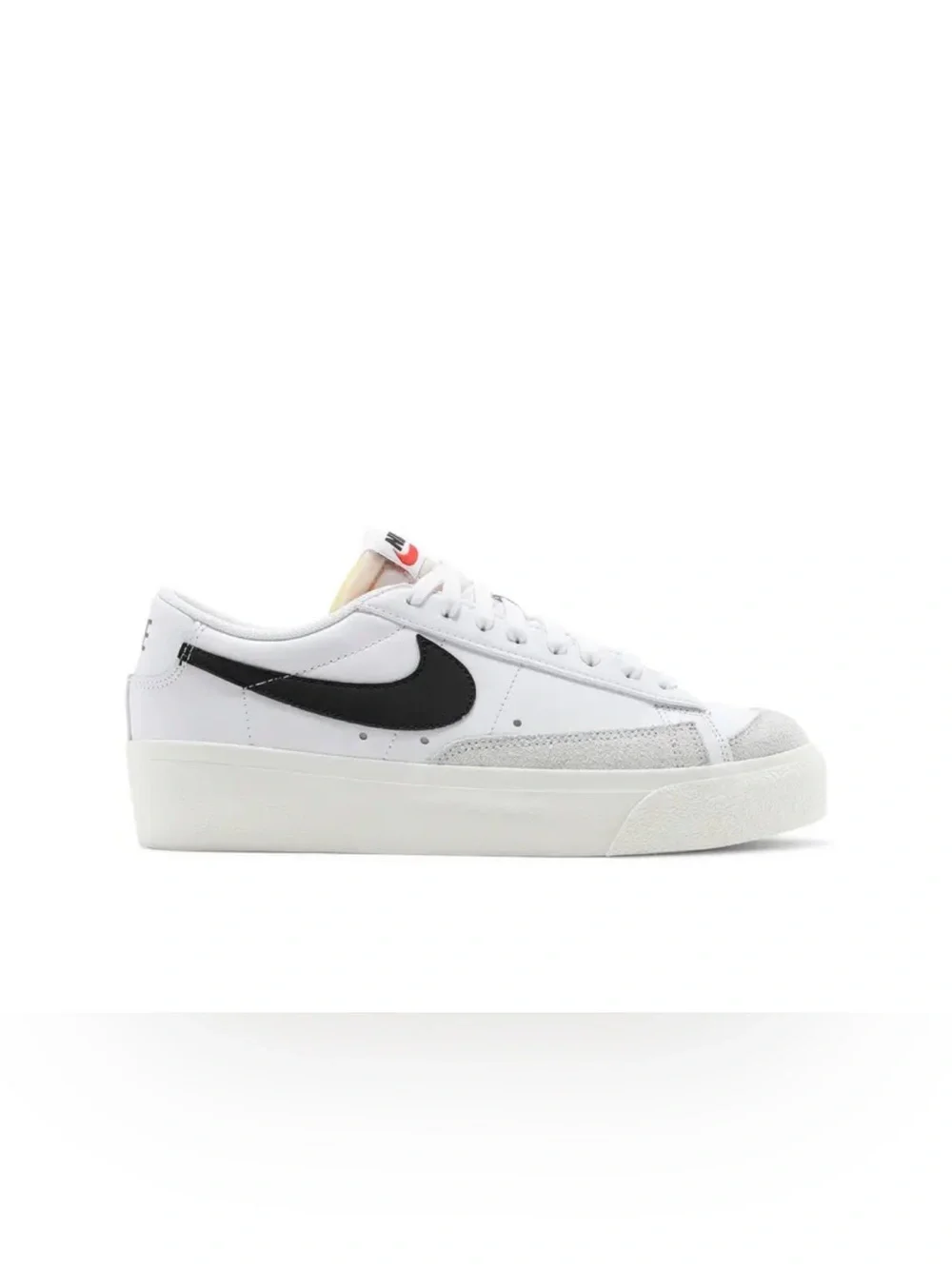 Nike Low-Top Sneaker in White and Black with Subtle Silver Accents